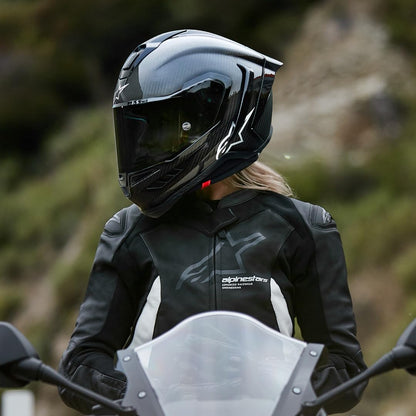 Alpinestars Supertech R10 carbon helmet, premium racing, CE certified, advanced ventilation.